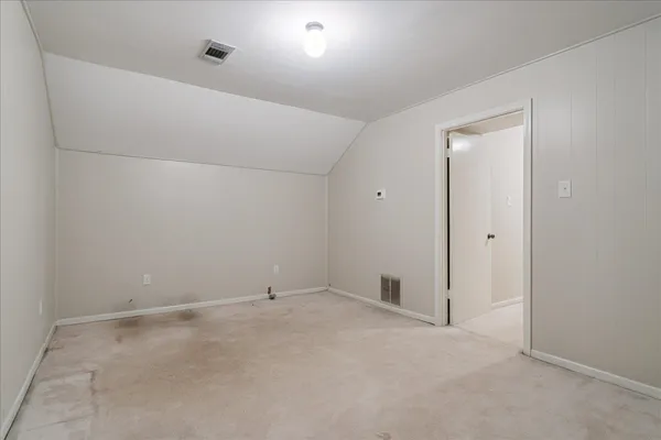 an empty room with an entryway