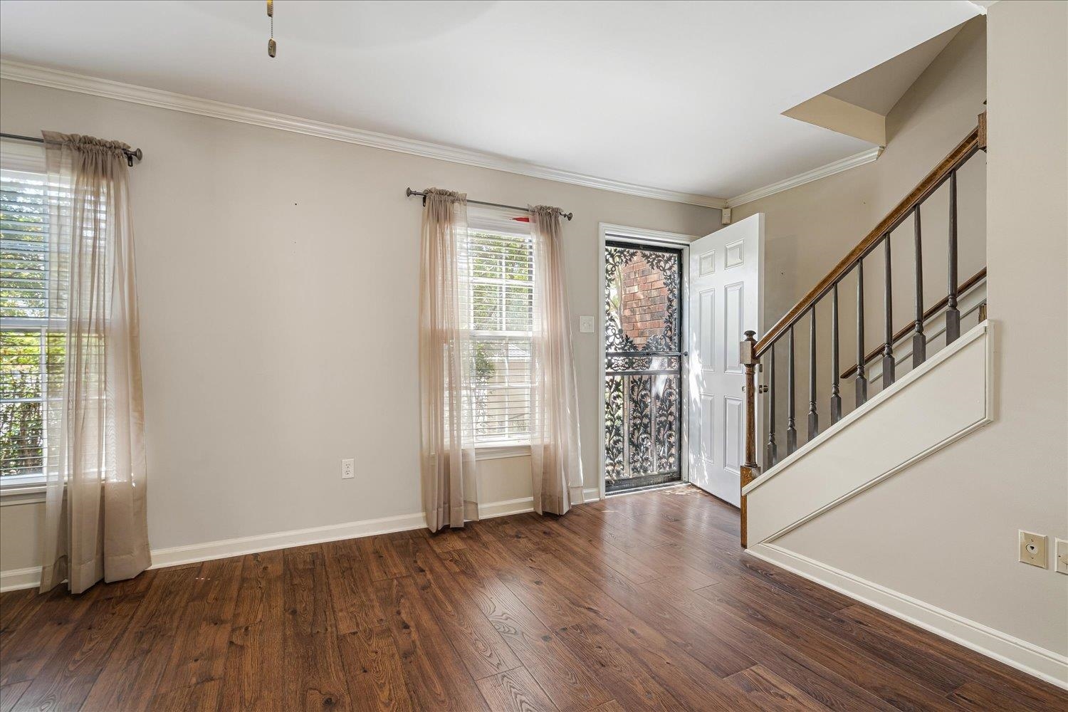 6976 Country Road, Unit 34 Germantown, TN 38138 - Photo 6 of 25 wooden floor in an empty room with a window
