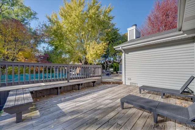 a view of a backyard with sitting area