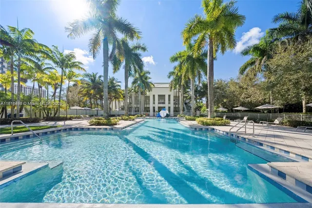 a sign that is sitting in front of flowers