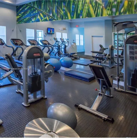 a balcony with furniture and a swing