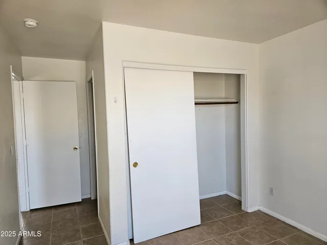 a bathroom with a bathtub and a toilet