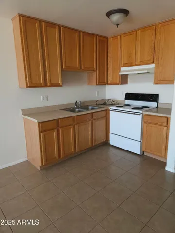 a bathroom with a toilet and shower