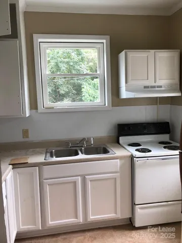 a utility room with washer and dryer