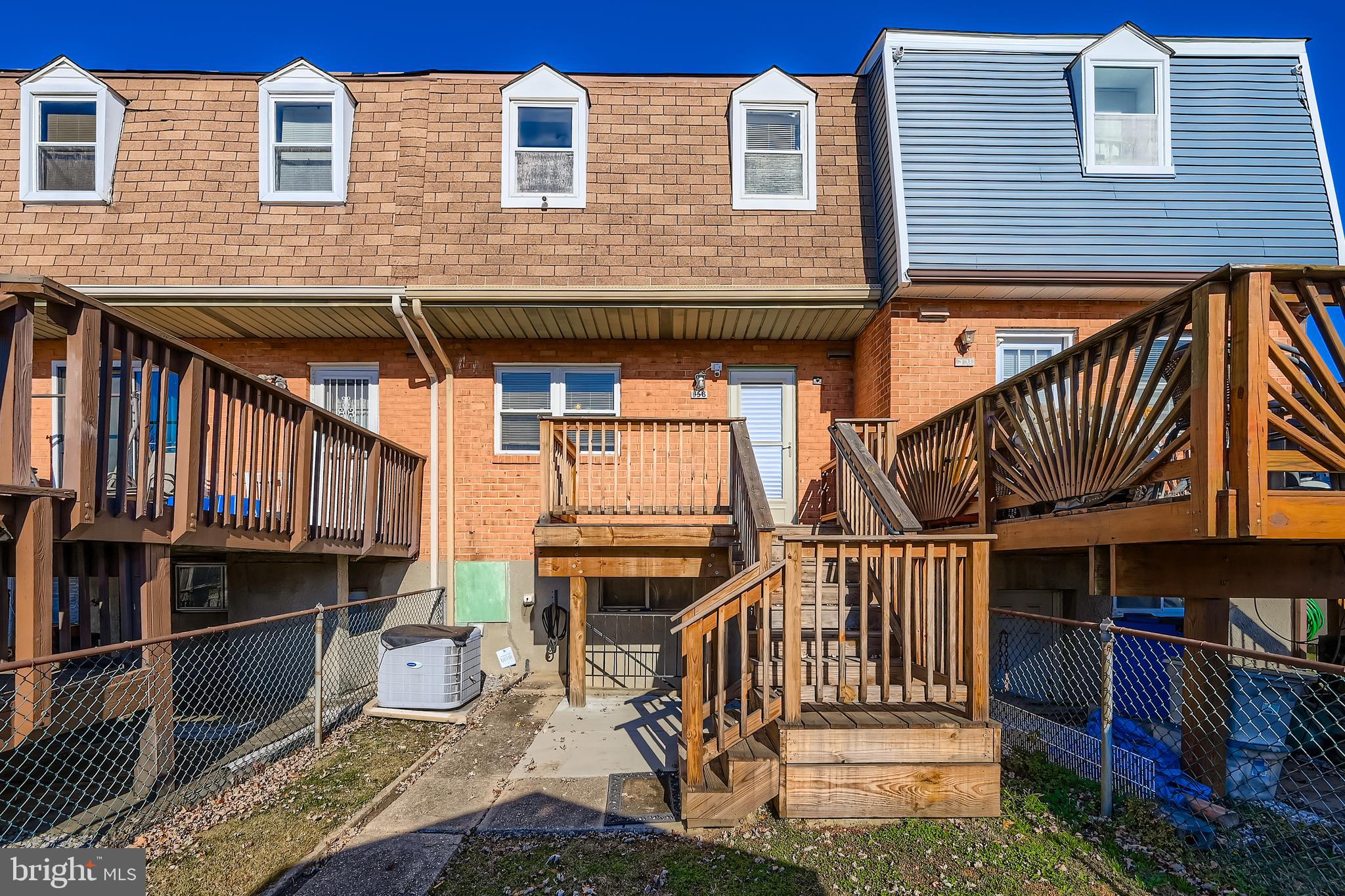 658 Kingston Road Baltimore, MD 21220 - Photo 27 of 28 a front view of a house with iron stairs