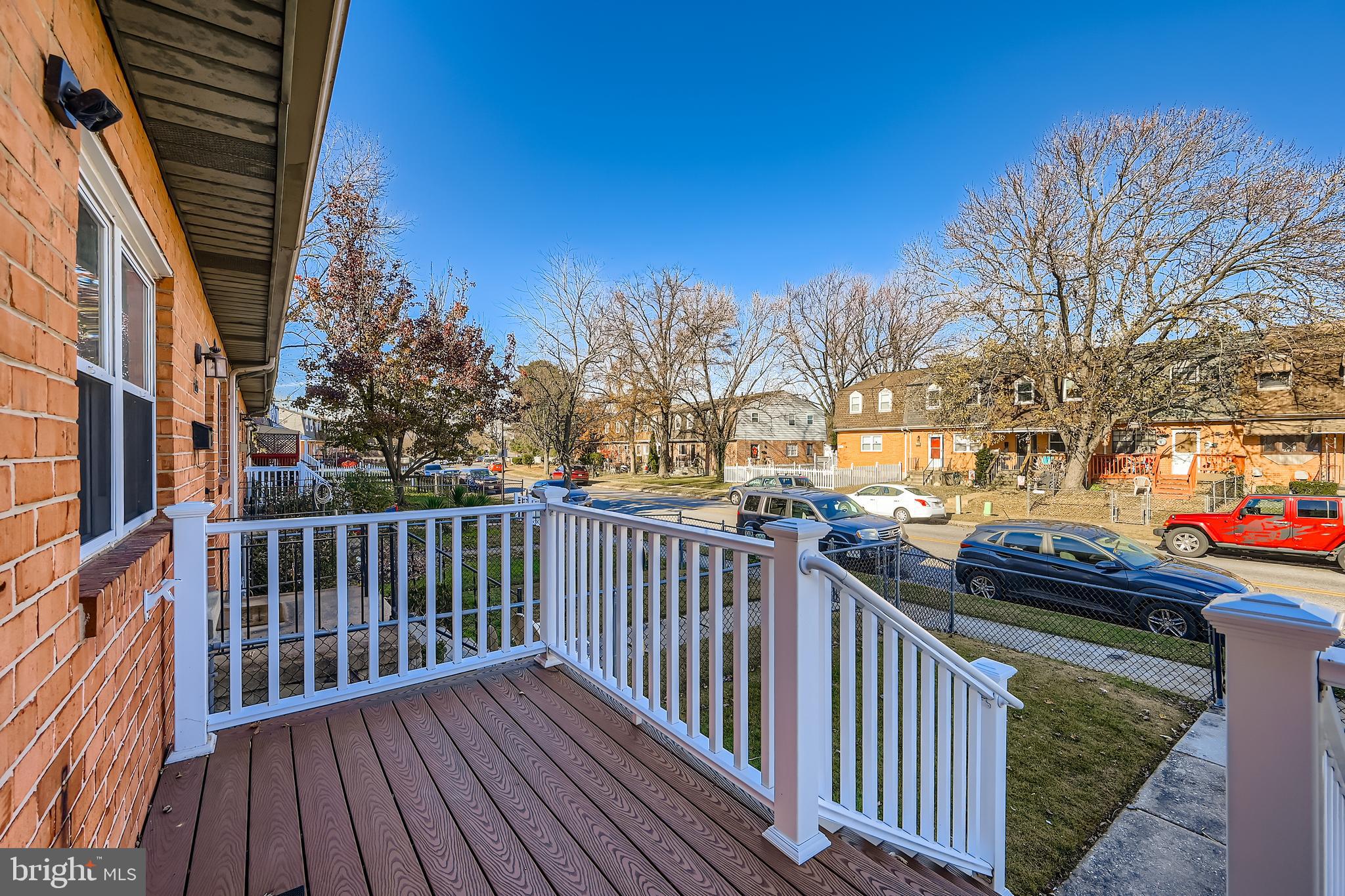658 Kingston Road Baltimore, MD 21220 - Photo 4 of 28 a view of a wooden street from a balcony
