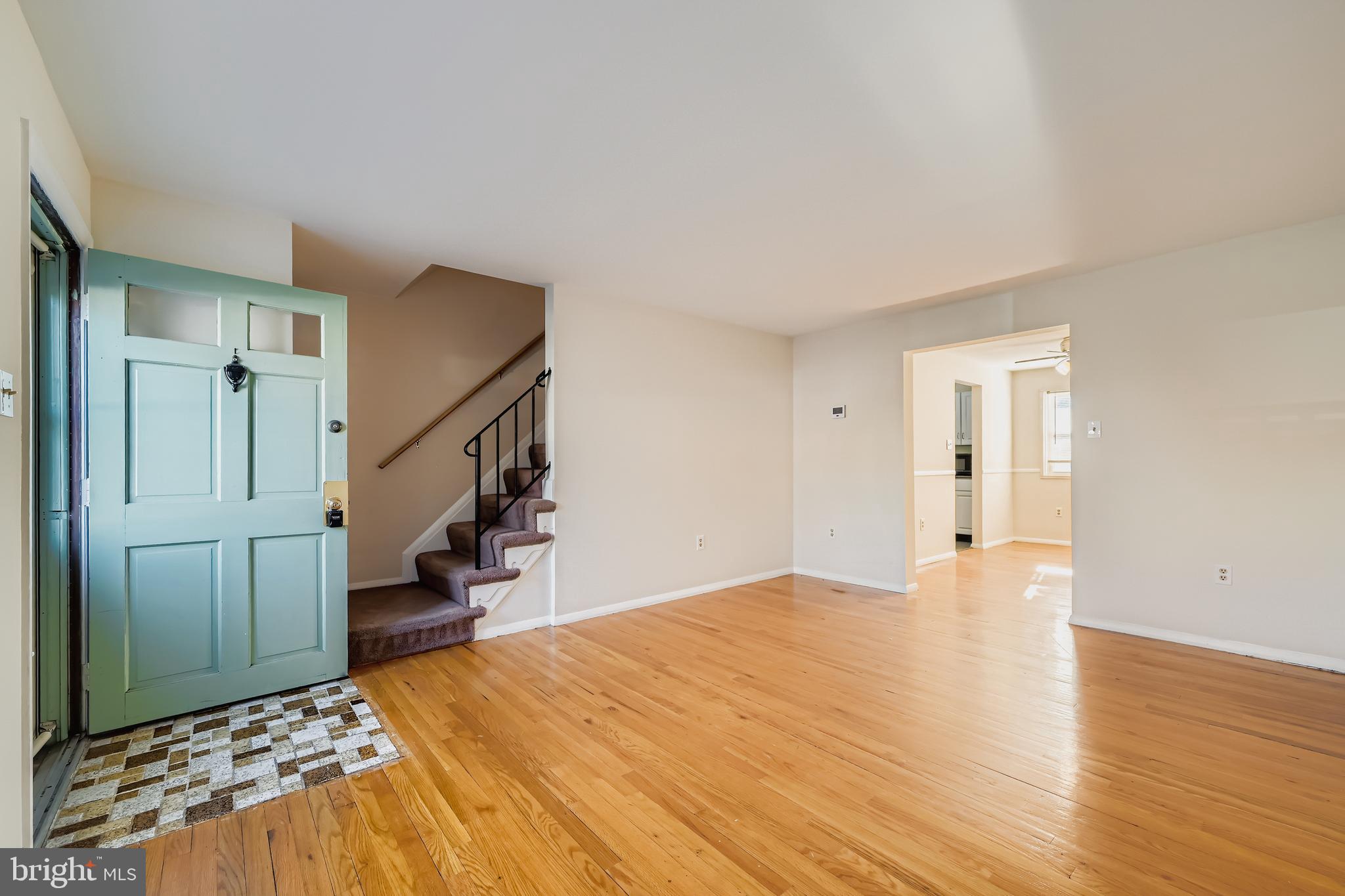 658 Kingston Road Baltimore, MD 21220 - Photo 8 of 28 a bedroom with a bed and a view of en suite bathroom