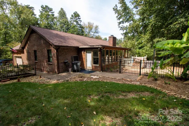 a view of a house with a yard porch and sitting area