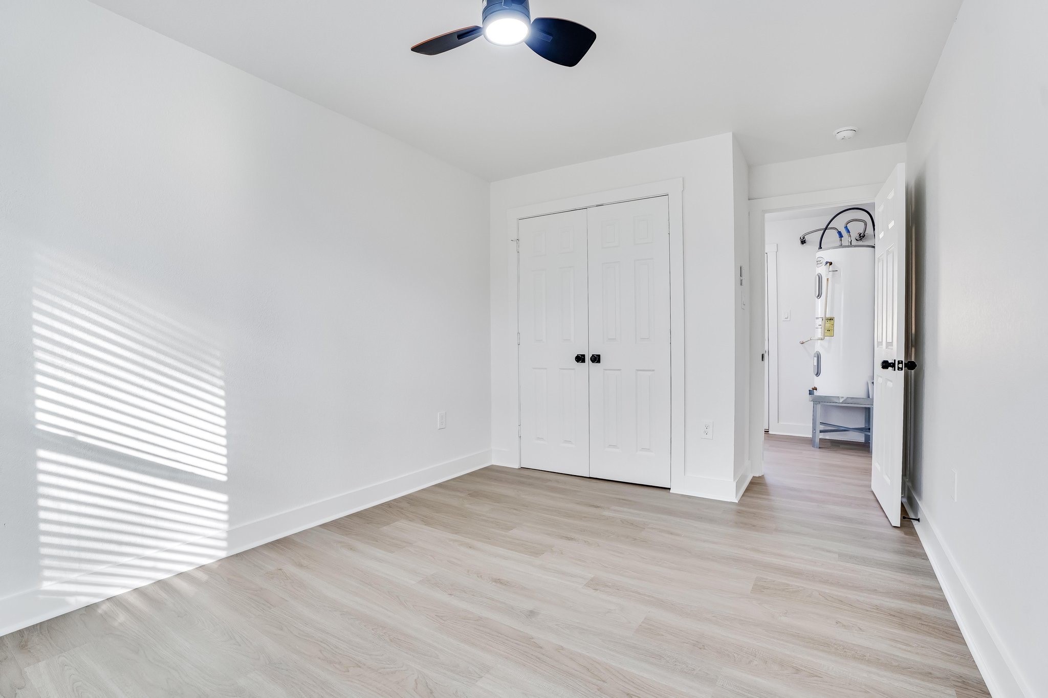 6123 Tuskegee Street Houston, TX 77091 - Photo 8 of 13 wooden floor in an empty room