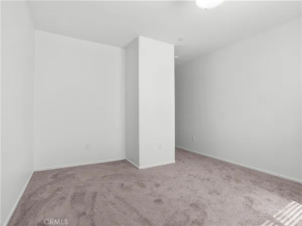 an empty room with closet