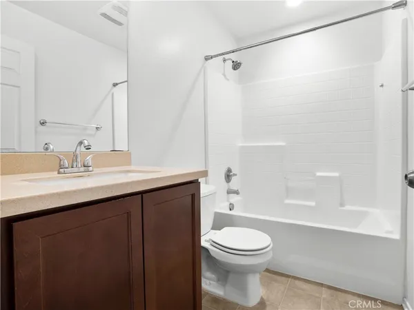 a utility room with washing machine