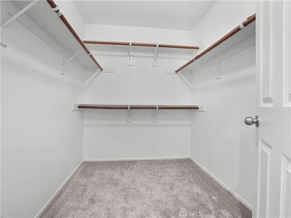 a white bath tub sitting next to a window