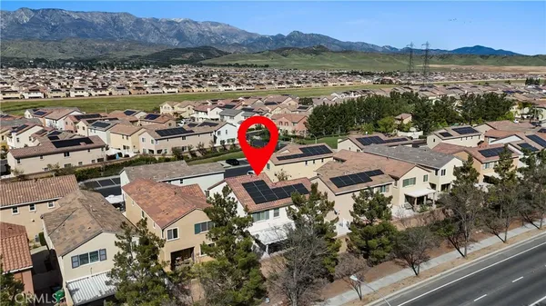 a view of a swimming pool with an outdoor seating