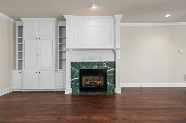 a room with a fireplace and a fireplace