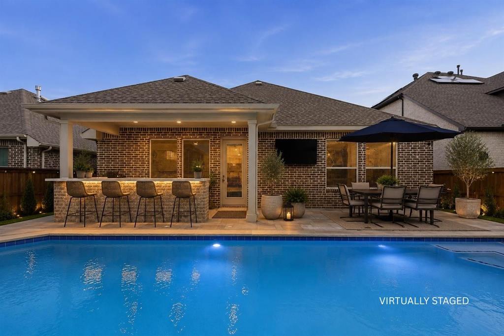3721 Prickly Pear Road Little Elm, TX 75068 - Photo 20 of 21 Backyard swimming pool with integrated lighting