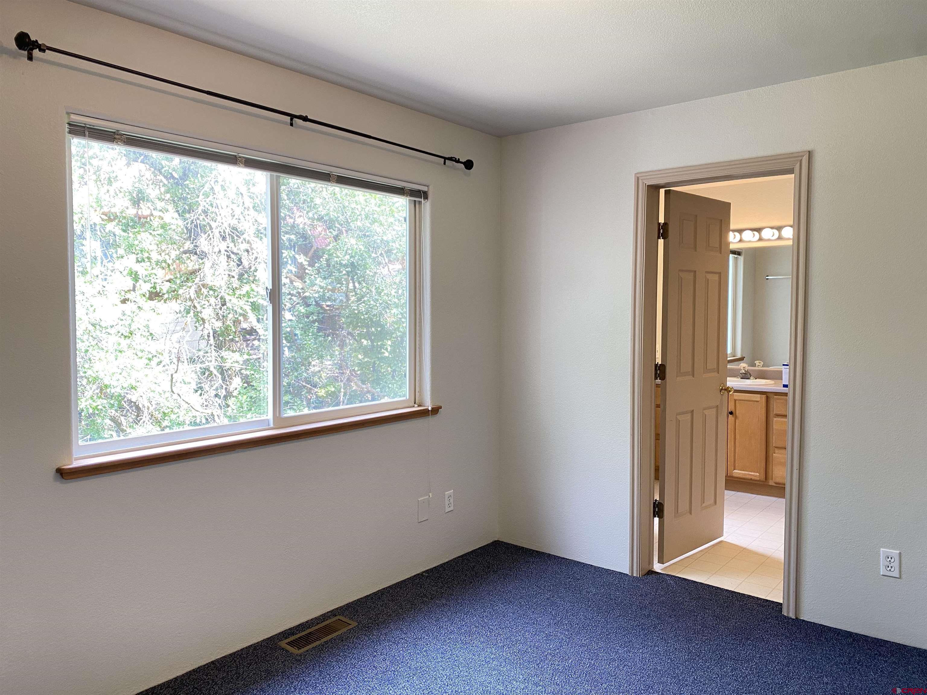 33 Sunridge Lane Durango, CO 81301 - Photo 17 of 37 a view of an empty room with a window