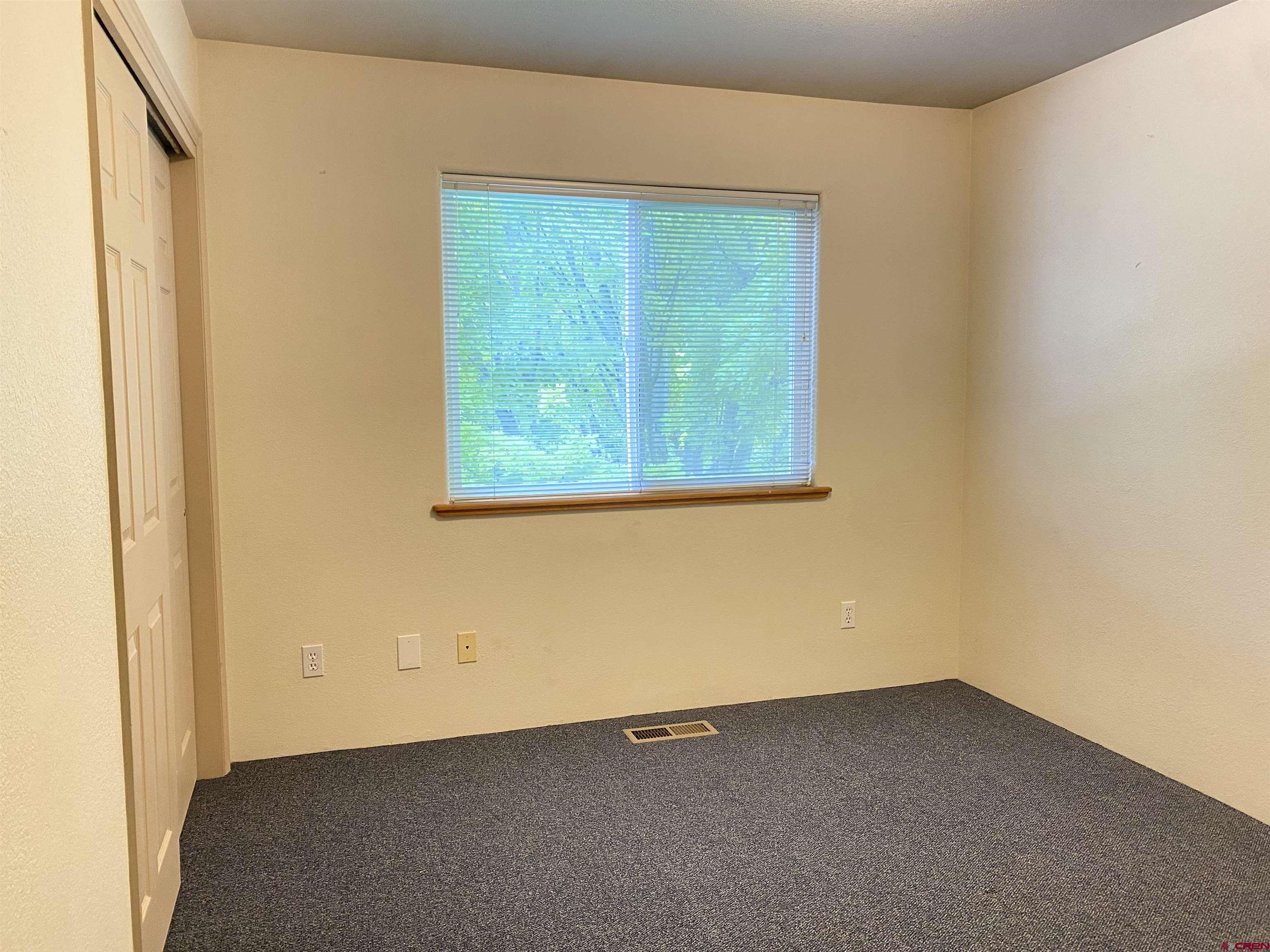33 Sunridge Lane Durango, CO 81301 - Photo 22 of 37 an empty room with windows