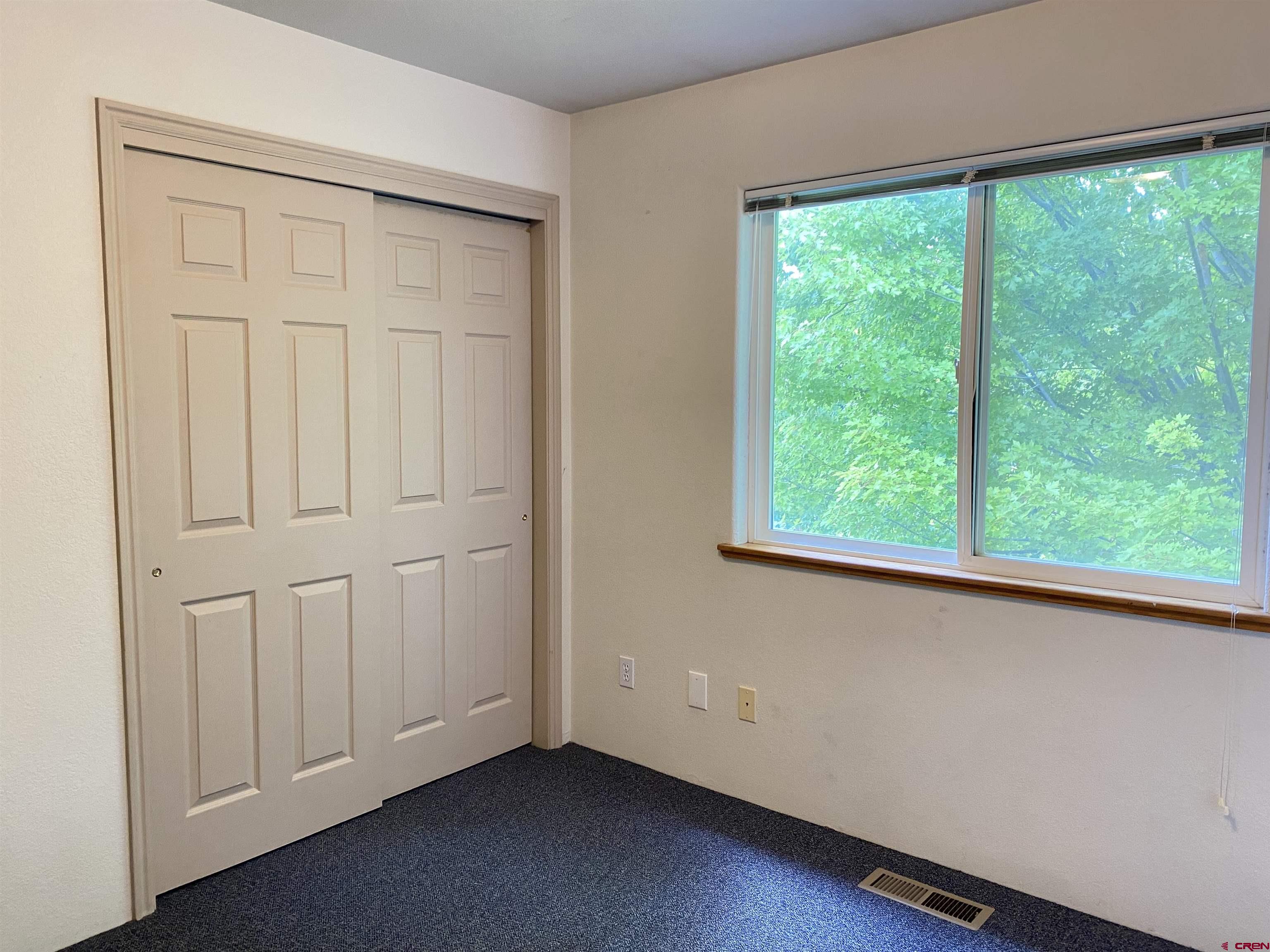 33 Sunridge Lane Durango, CO 81301 - Photo 23 of 37 an empty room with a window