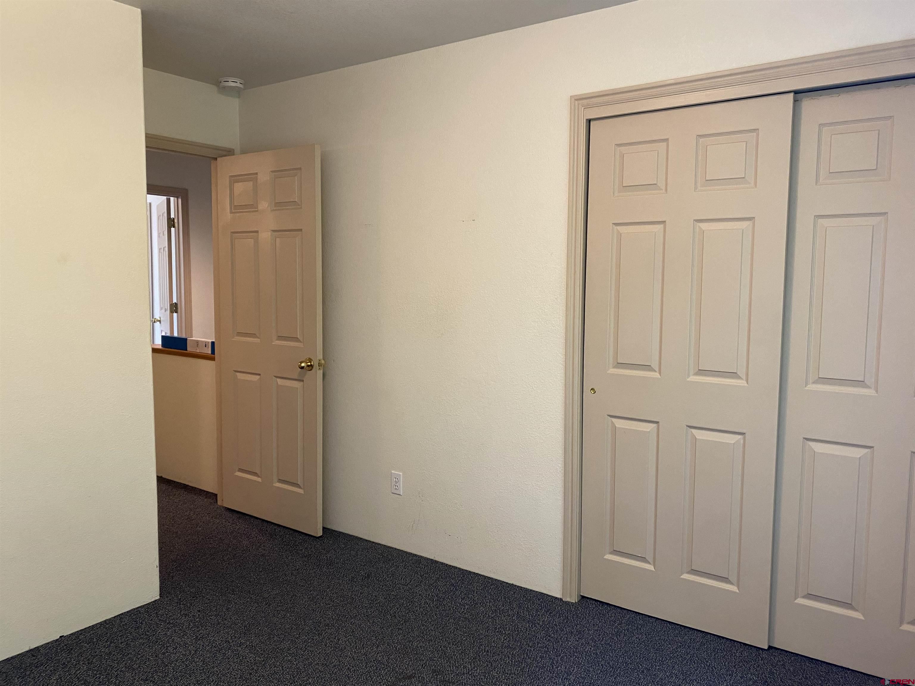 33 Sunridge Lane Durango, CO 81301 - Photo 24 of 37 an empty room with closet area