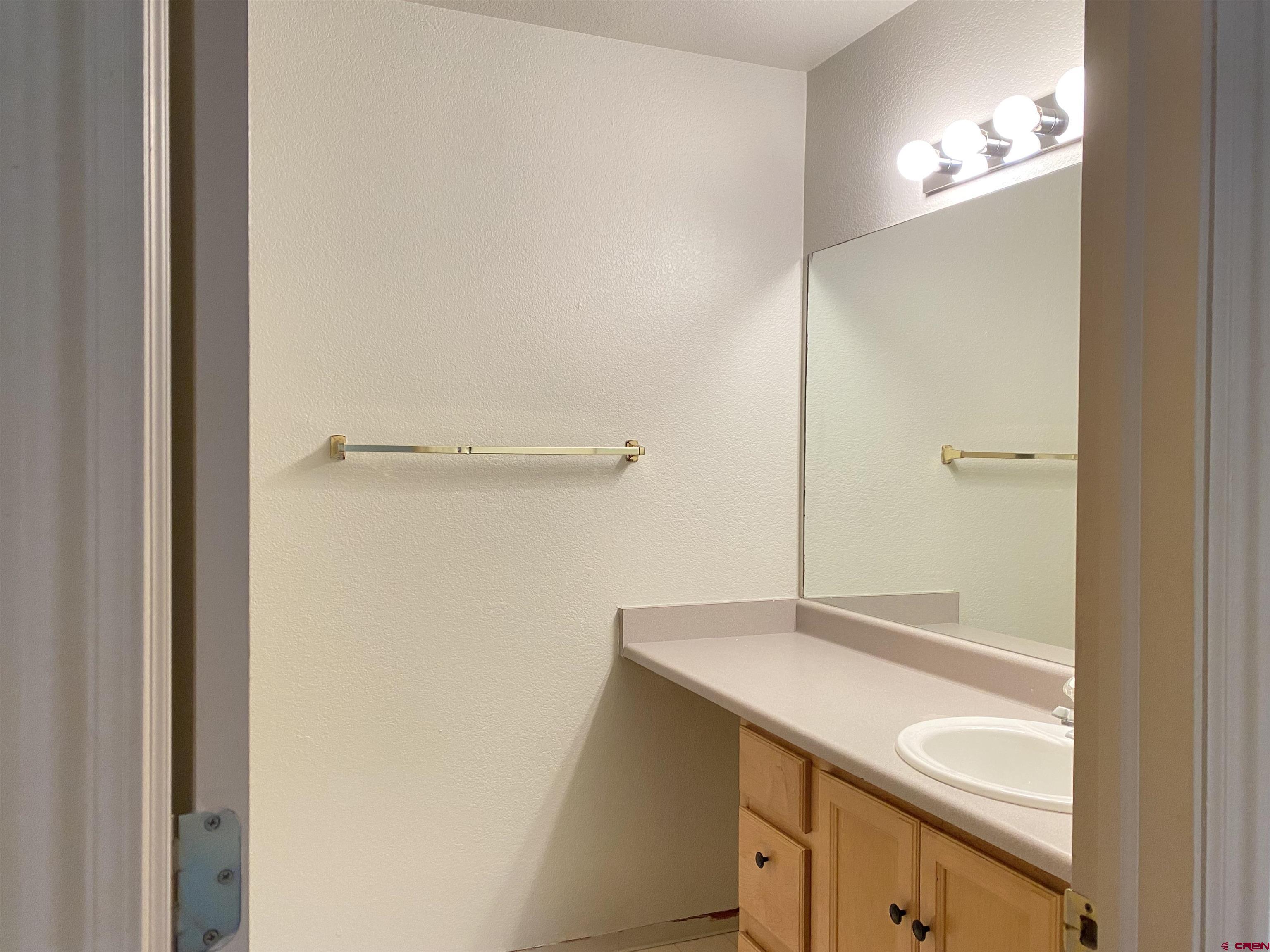 33 Sunridge Lane Durango, CO 81301 - Photo 25 of 37 a bathroom with a shower and a sink