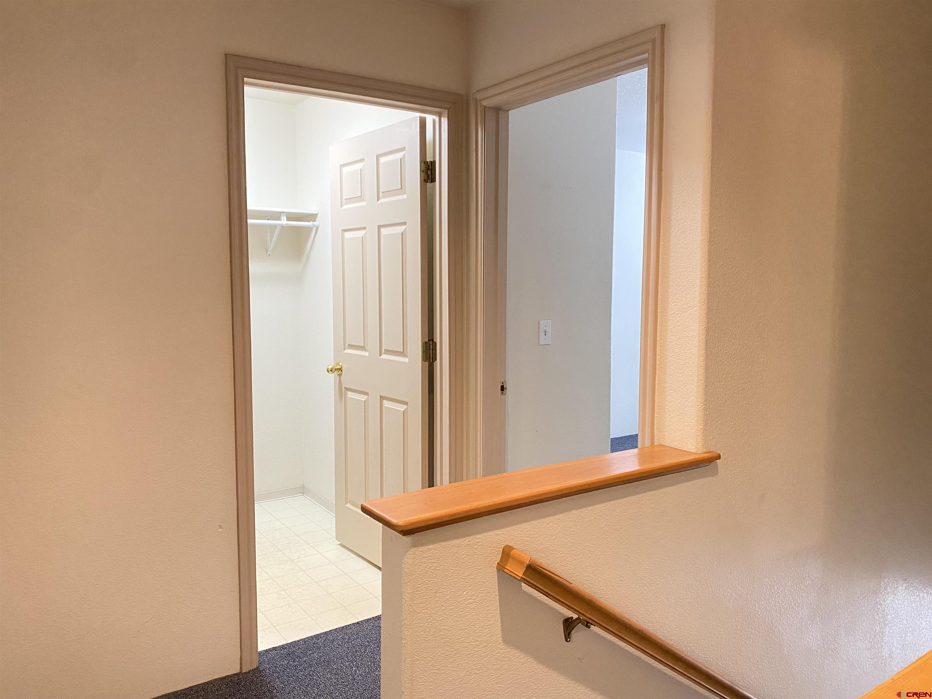 33 Sunridge Lane Durango, CO 81301 - Photo 27 of 37 a view of a room that has a door and wooden floor