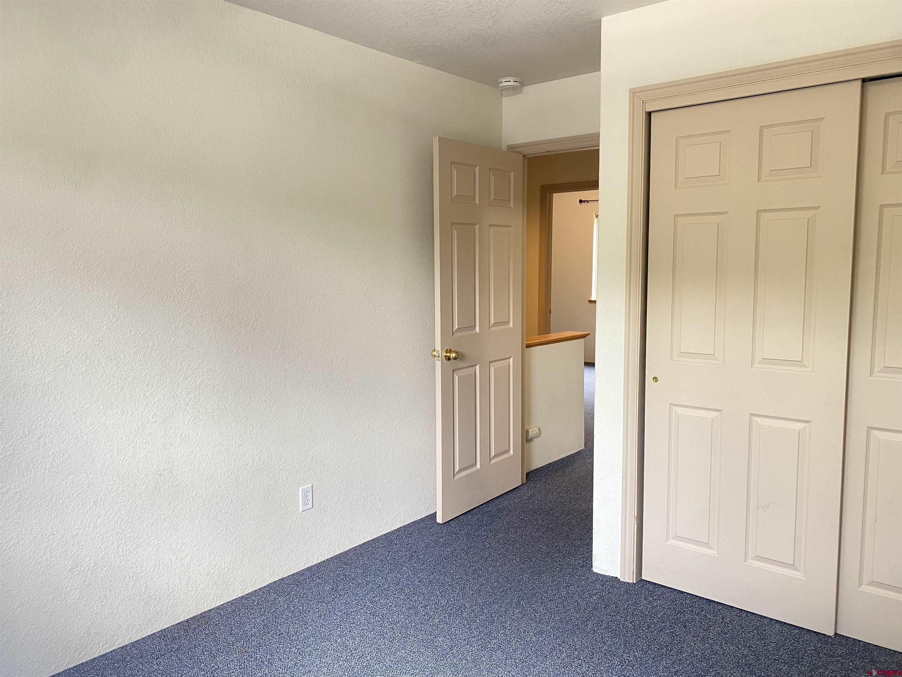 33 Sunridge Lane Durango, CO 81301 - Photo 30 of 37 an empty room with a door