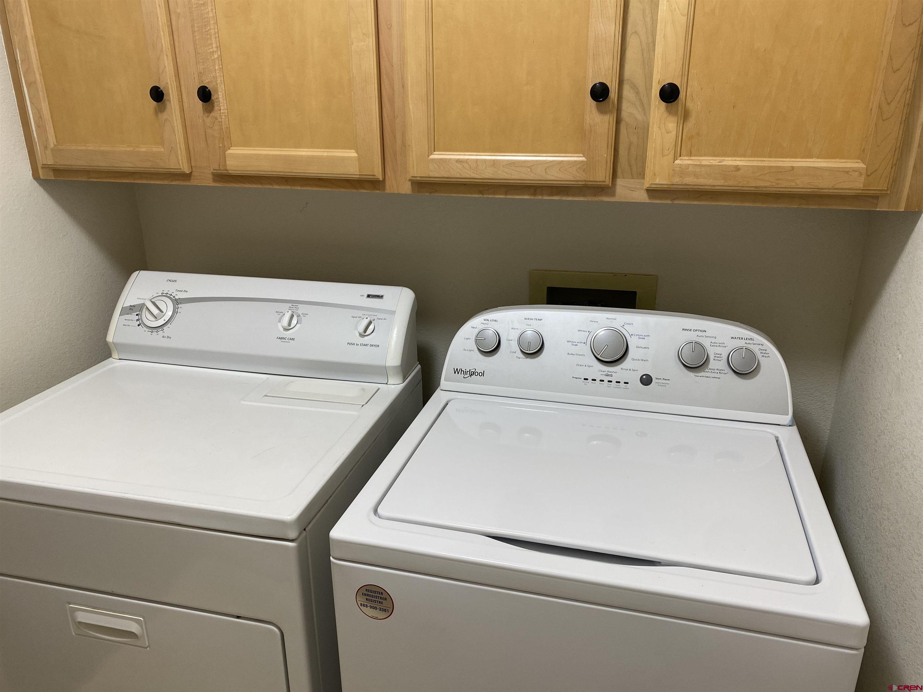 33 Sunridge Lane Durango, CO 81301 - Photo 32 of 37 a utility room with dryer and washer
