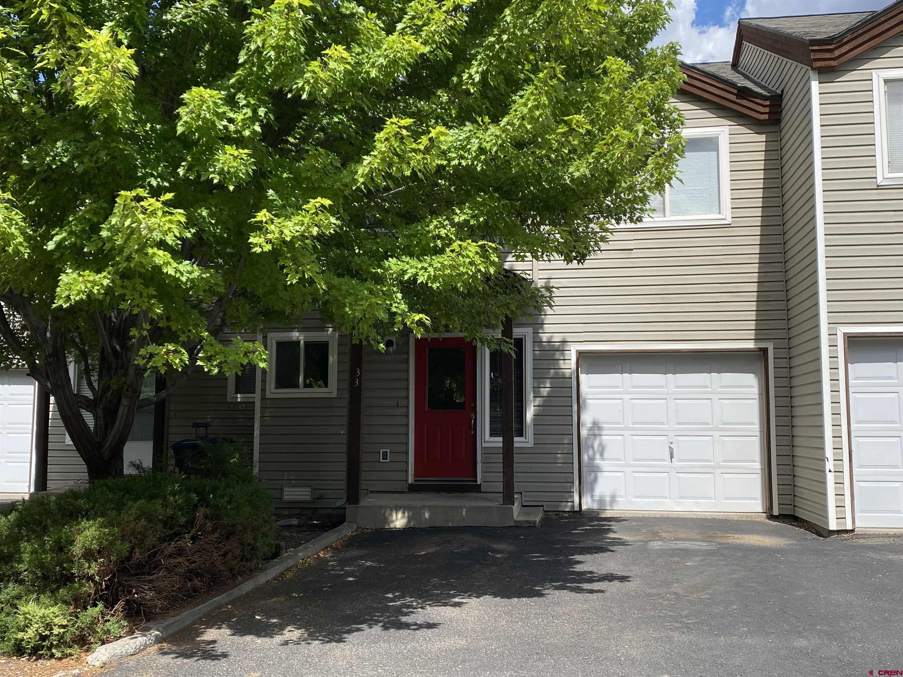 33 Sunridge Lane Durango, CO 81301 - Photo 37 of 37 a front view of a house with a garage