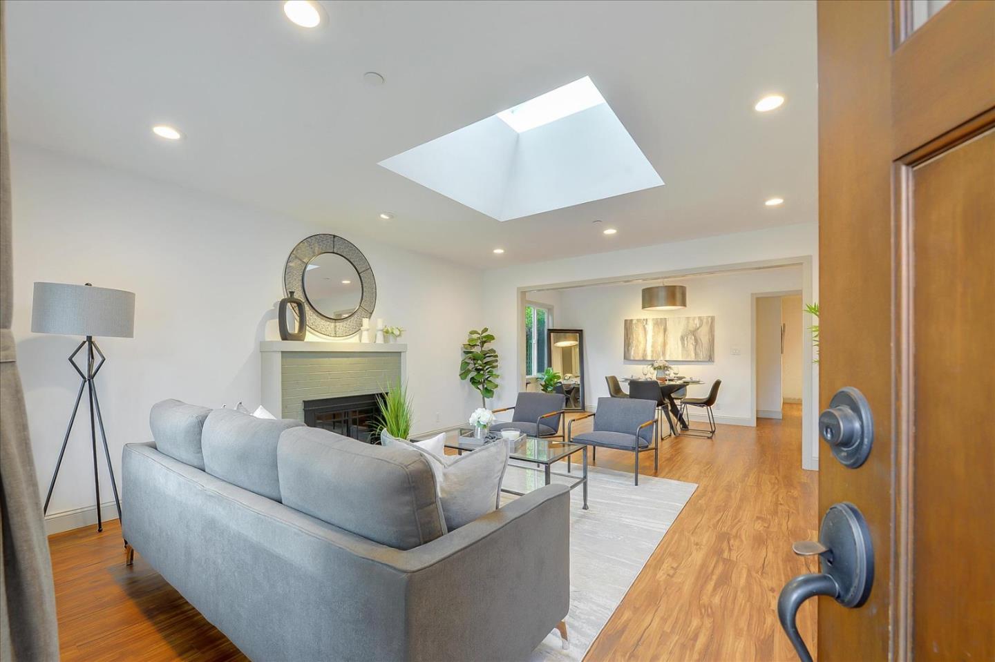 112 Haight Street Menlo Park, CA 94025 - Photo 2 of 47 a living room with furniture and a fireplace