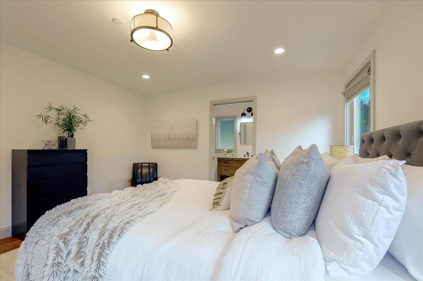 112 Haight Street Menlo Park, CA 94025 - Photo 26 of 47 a bedroom with a bed and a dresser