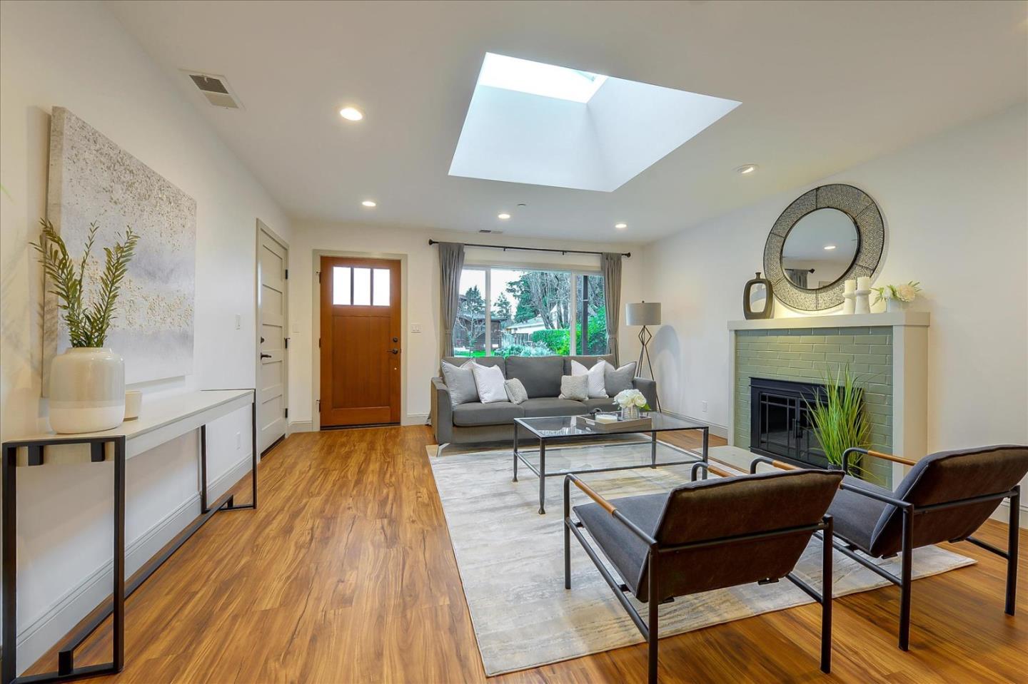 112 Haight Street Menlo Park, CA 94025 - Photo 3 of 47 a living room with furniture and wooden floor
