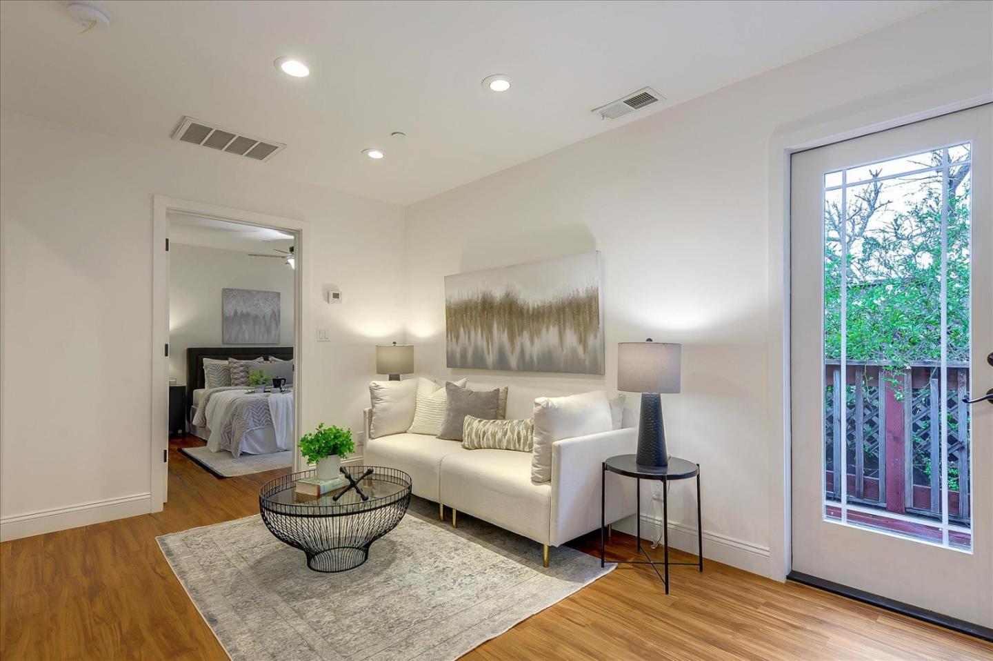 112 Haight Street Menlo Park, CA 94025 - Photo 34 of 47 a living room with furniture and a potted plant