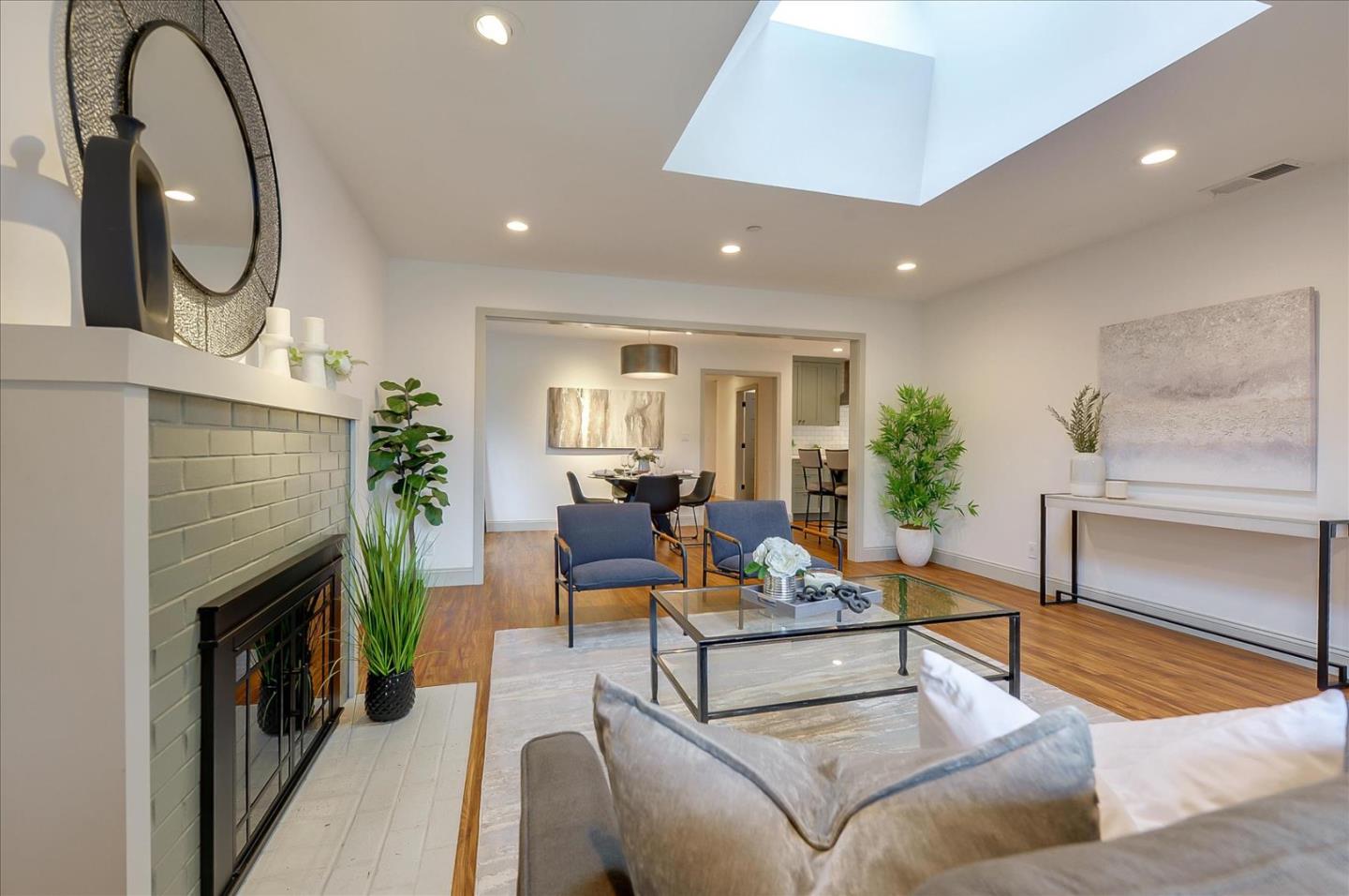 112 Haight Street Menlo Park, CA 94025 - Photo 6 of 47 a living room with furniture and a fireplace
