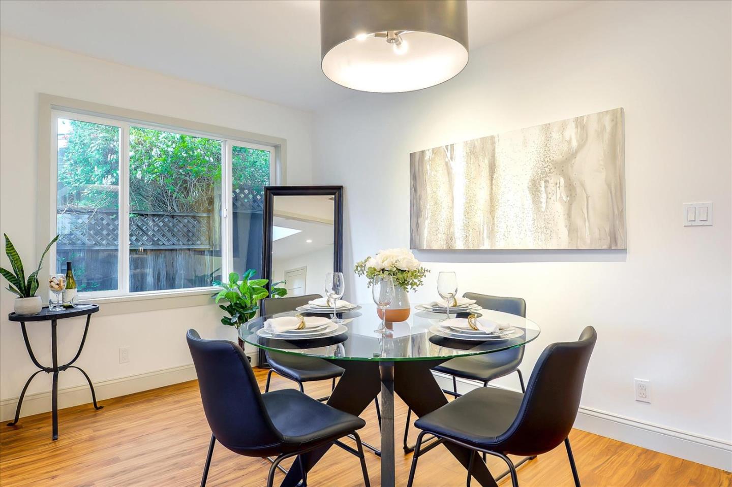 112 Haight Street Menlo Park, CA 94025 - Photo 7 of 47 a view of a dining room with furniture and wooden floor