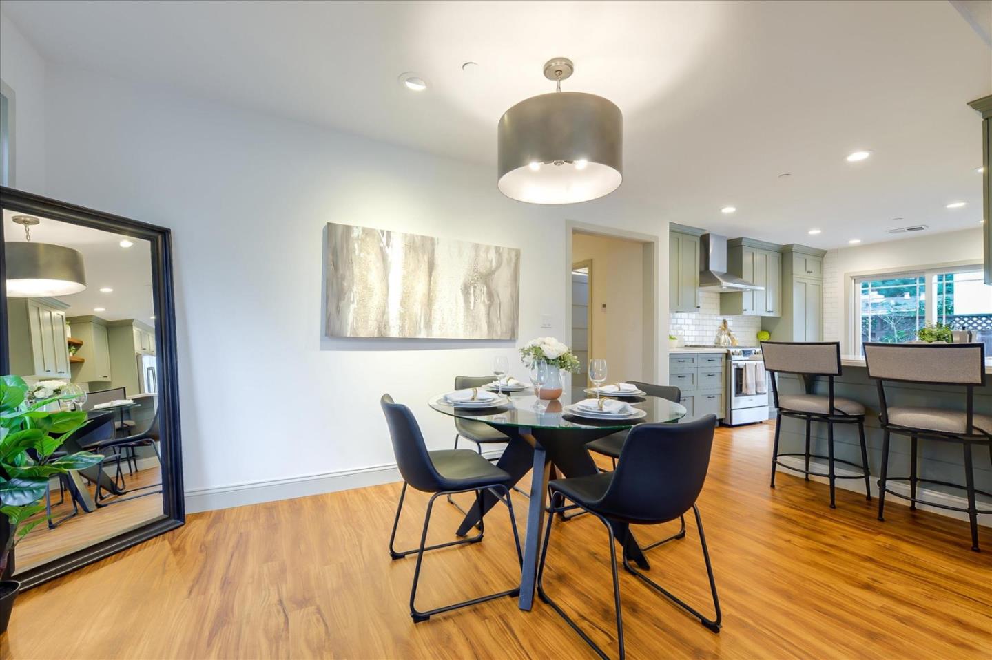112 Haight Street Menlo Park, CA 94025 - Photo 10 of 47 a view of a dining room with furniture and wooden floor