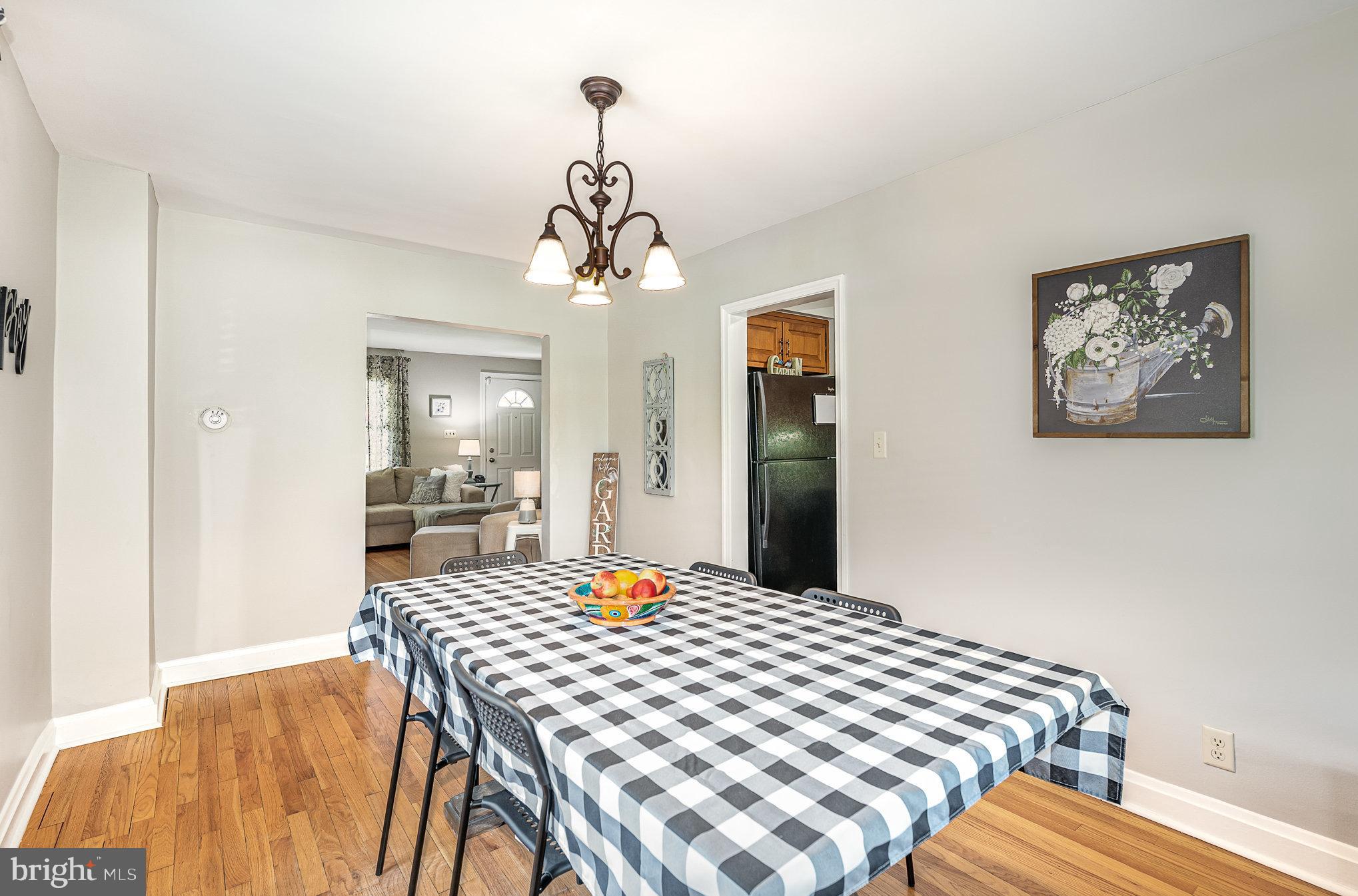 200 Riverthorn Road Middle River, MD 21220 - Photo 11 of 46 a bedroom with a bed and wooden floor