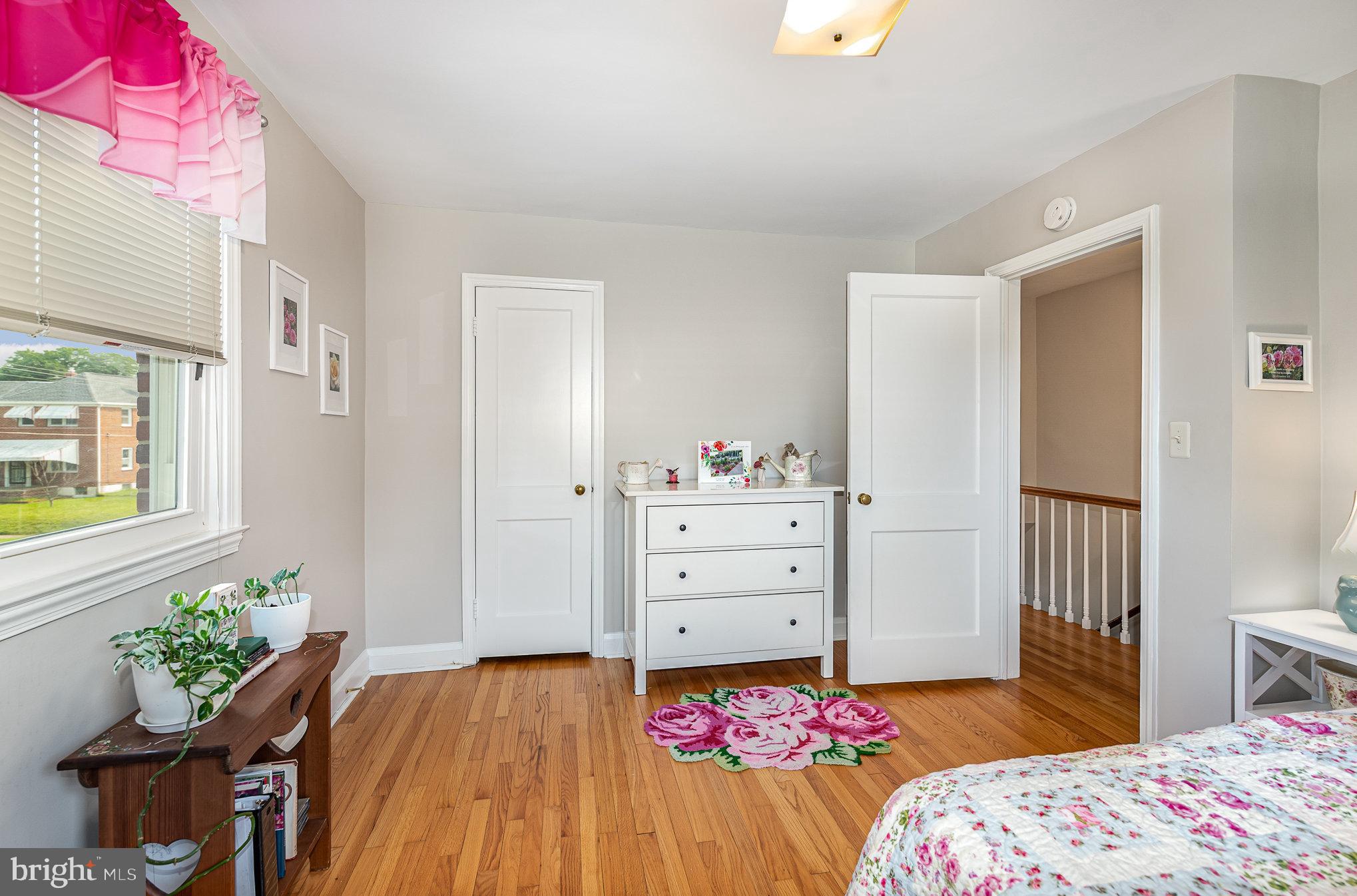 200 Riverthorn Road Middle River, MD 21220 - Photo 17 of 46 a bed room with a bed and a dresser