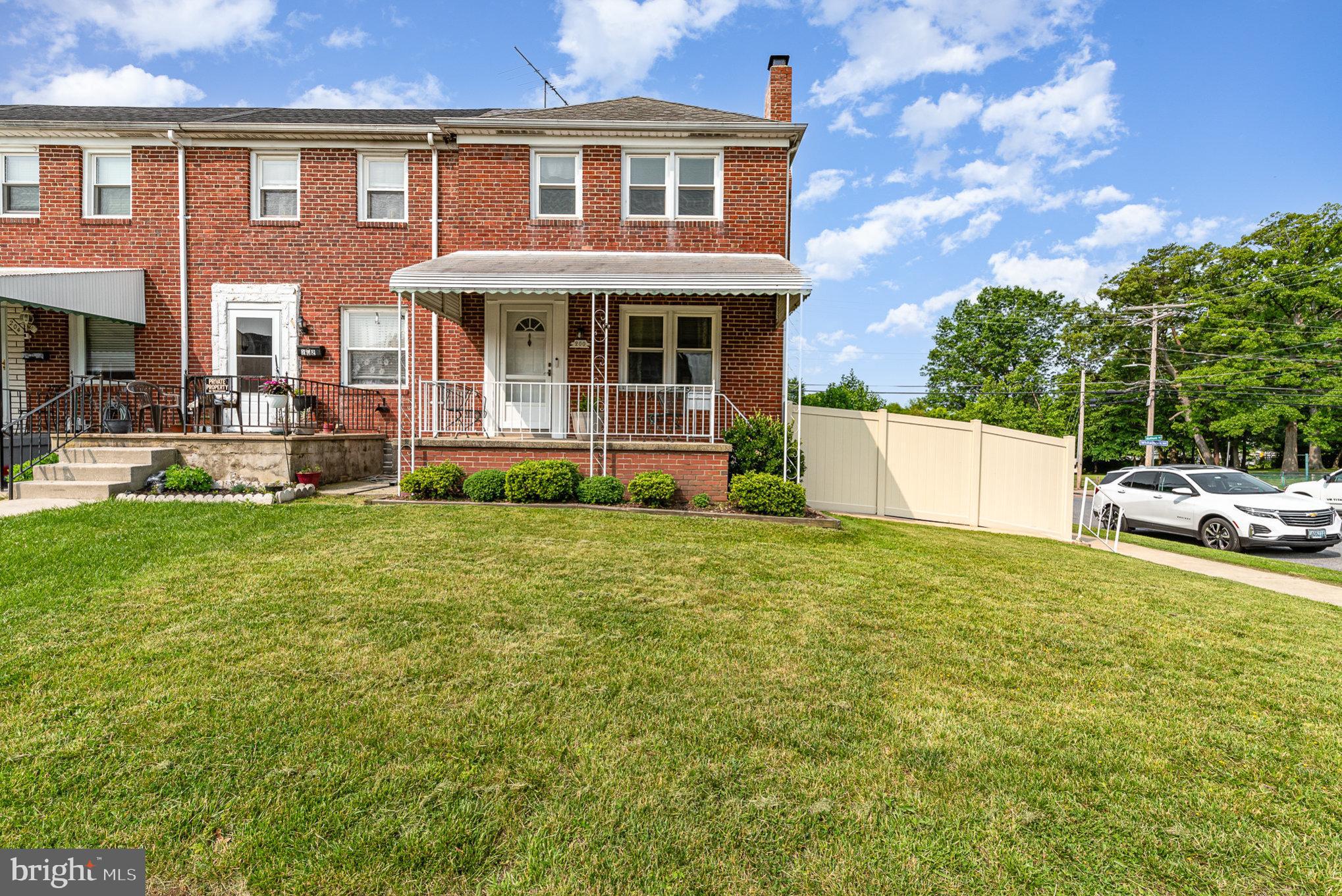 200 Riverthorn Road Middle River, MD 21220 - Photo 2 of 46 front view of a house with a yard