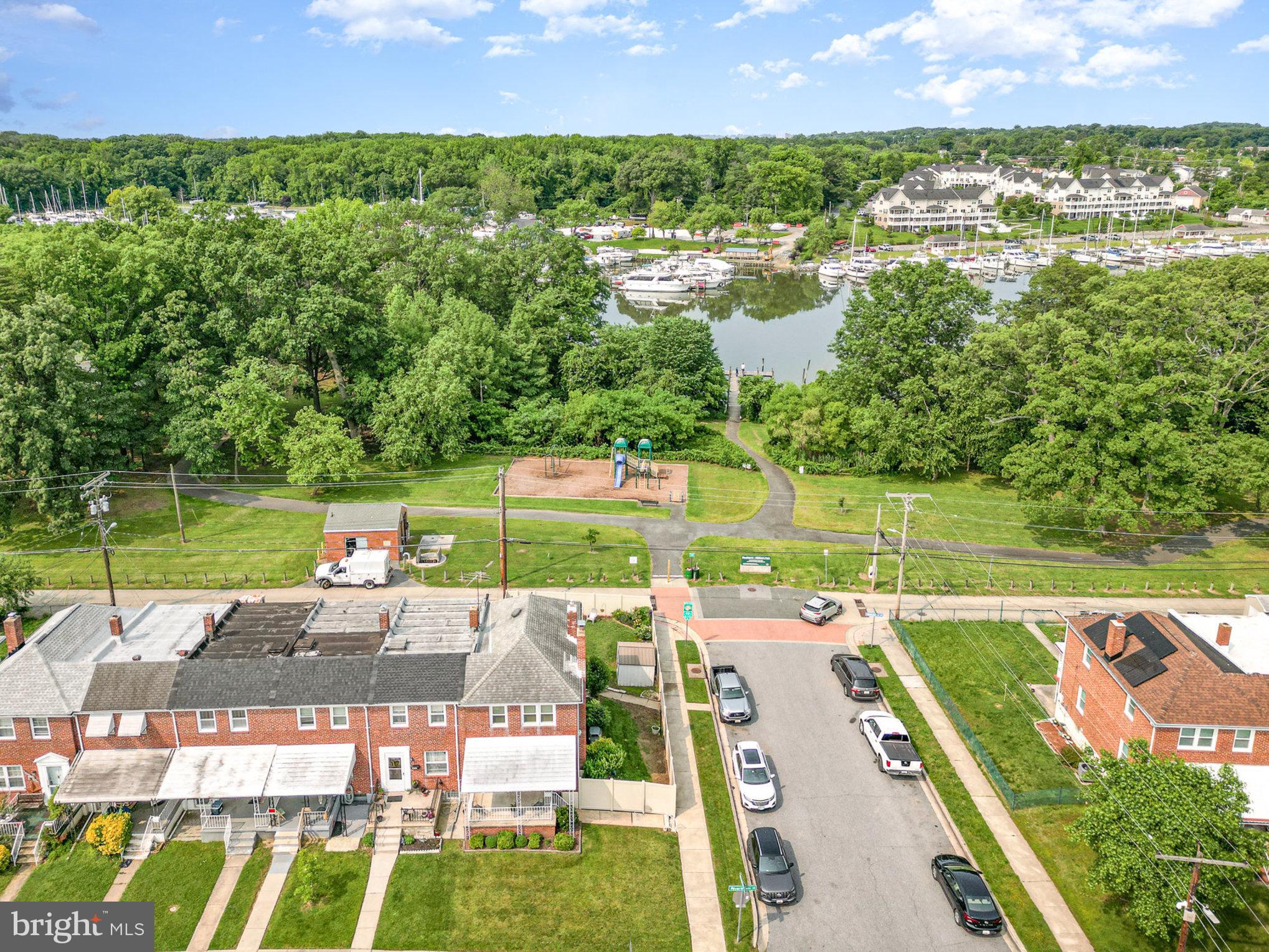 200 Riverthorn Road Middle River, MD 21220 - Photo 38 of 46 an aerial view of a house with a garden and lake view