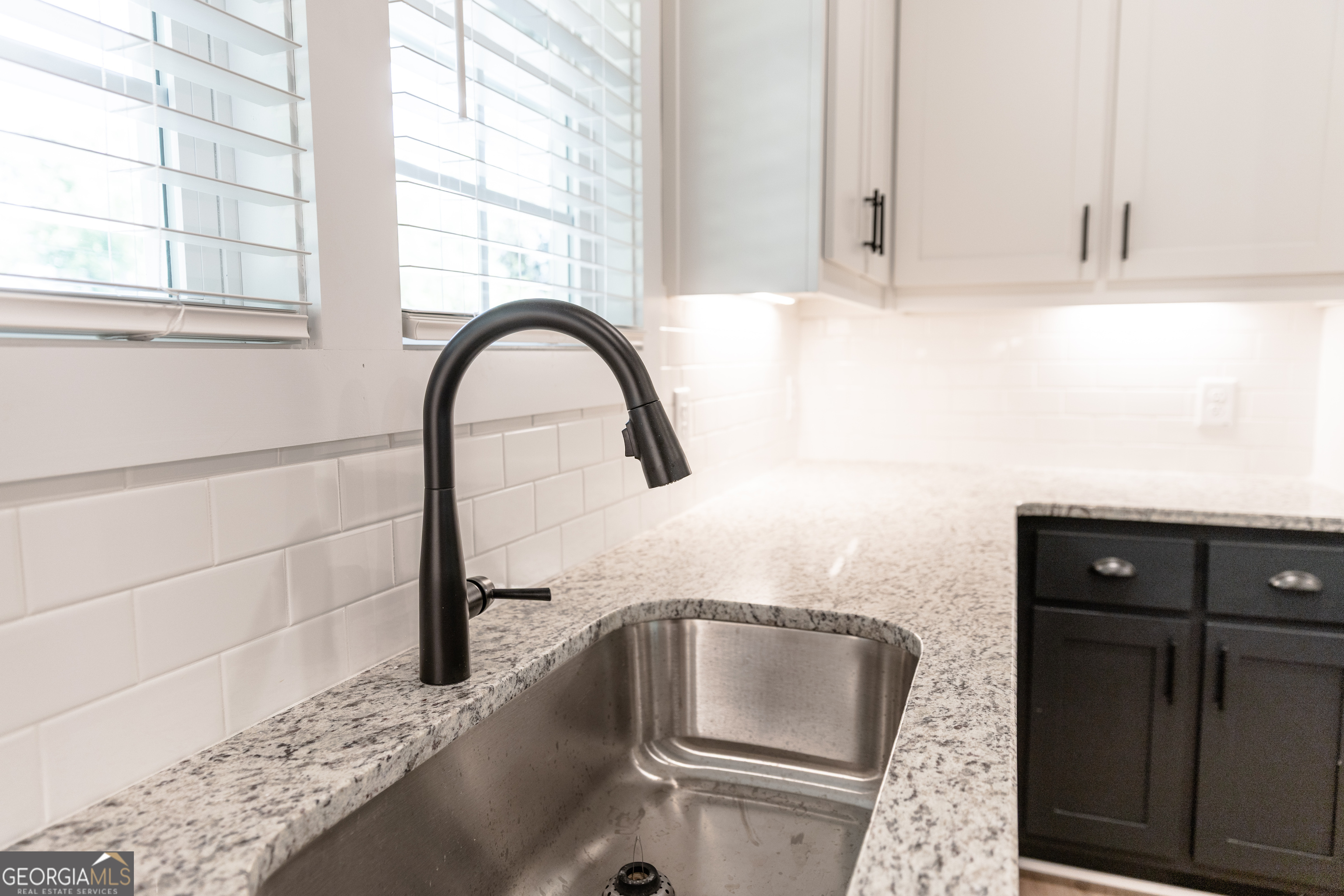 632 Campbell Road Covington, GA 30014 - Photo 10 of 60 a close view of a sink and a stove
