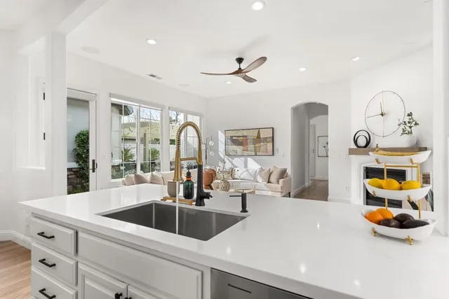 a bedroom with a bed window and couch