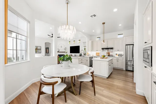 a bathroom with a sink double vanity and a mirror