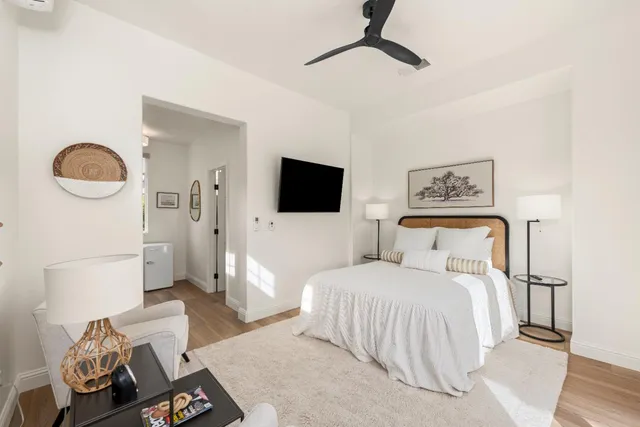an aerial view of a house with a yard and a fountain