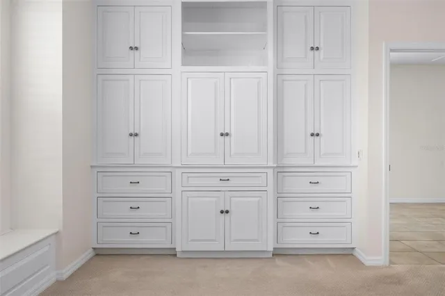 an aerial view of a house with outdoor space