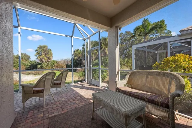 a view of a golf course with a lake