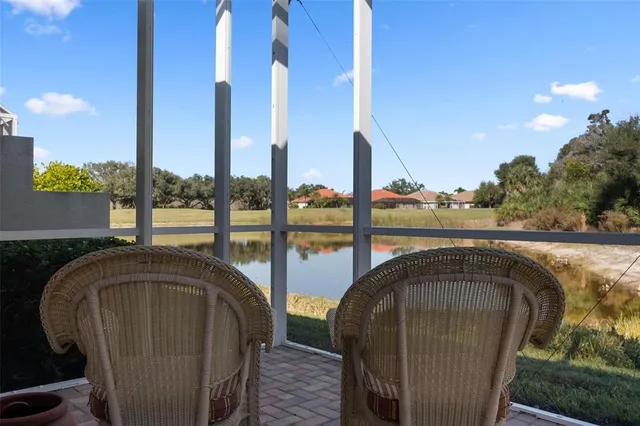 a view of a swimming pool with a lounge chairs