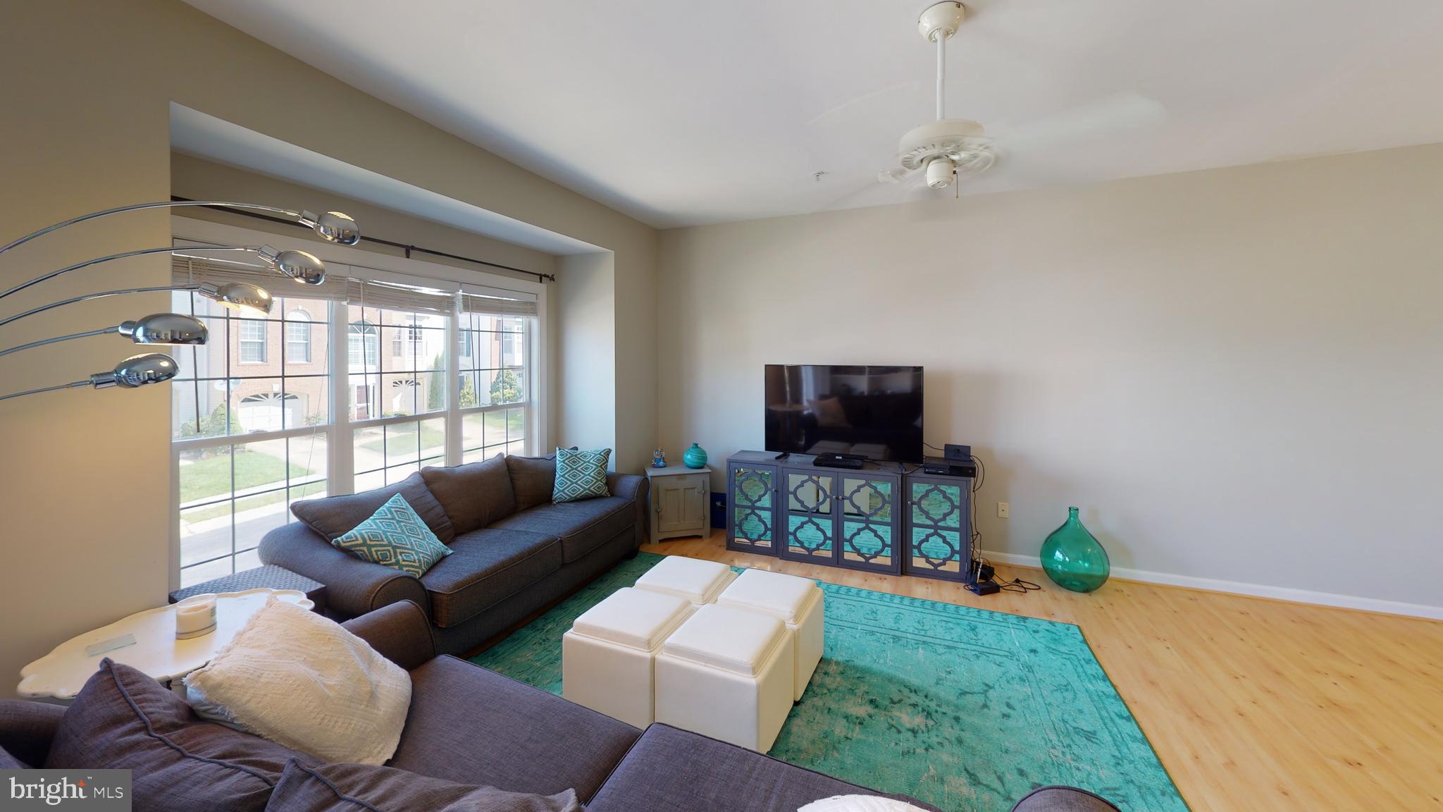 8704 Riverscape Court Odenton, MD 21113 - Photo 23 of 62 Living room with hard wood floors