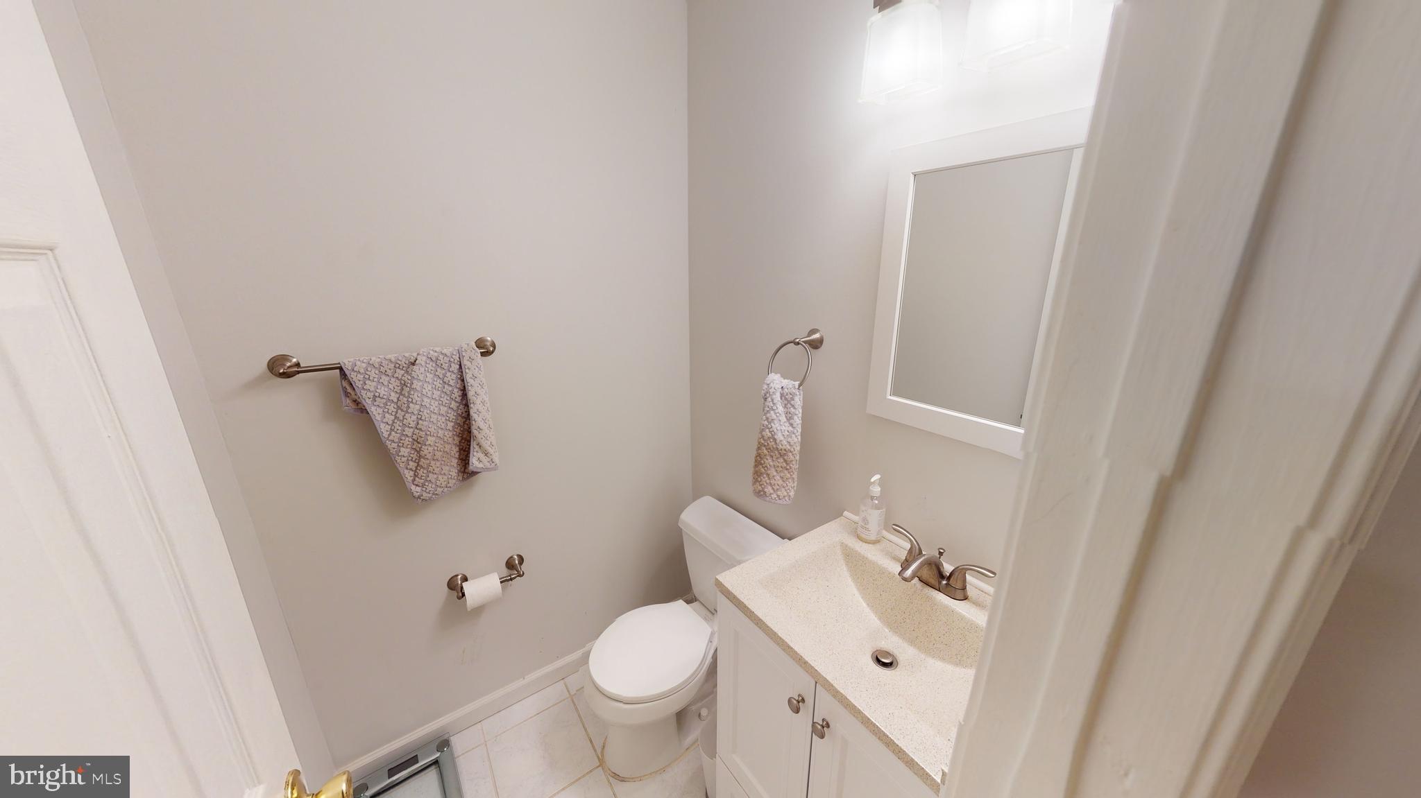 8704 Riverscape Court Odenton, MD 21113 - Photo 28 of 62 Powder room on main level