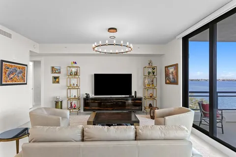 a living room with furniture and a rug