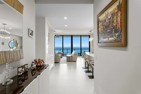 a kitchen with kitchen island a sink counter space and stainless steel appliances